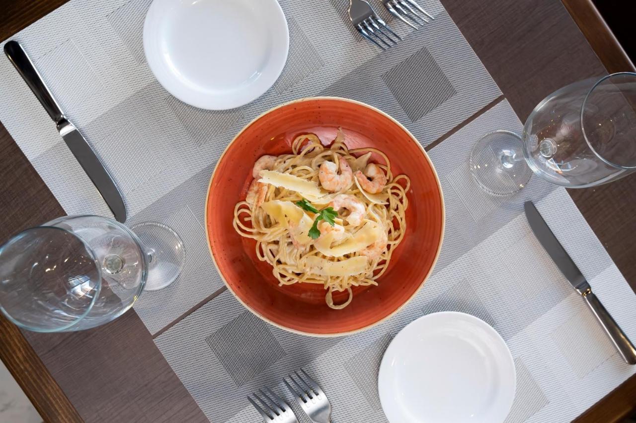 Metria Hotel León de los Aldamas Extérieur photo A plate of spaghetti alla vodka