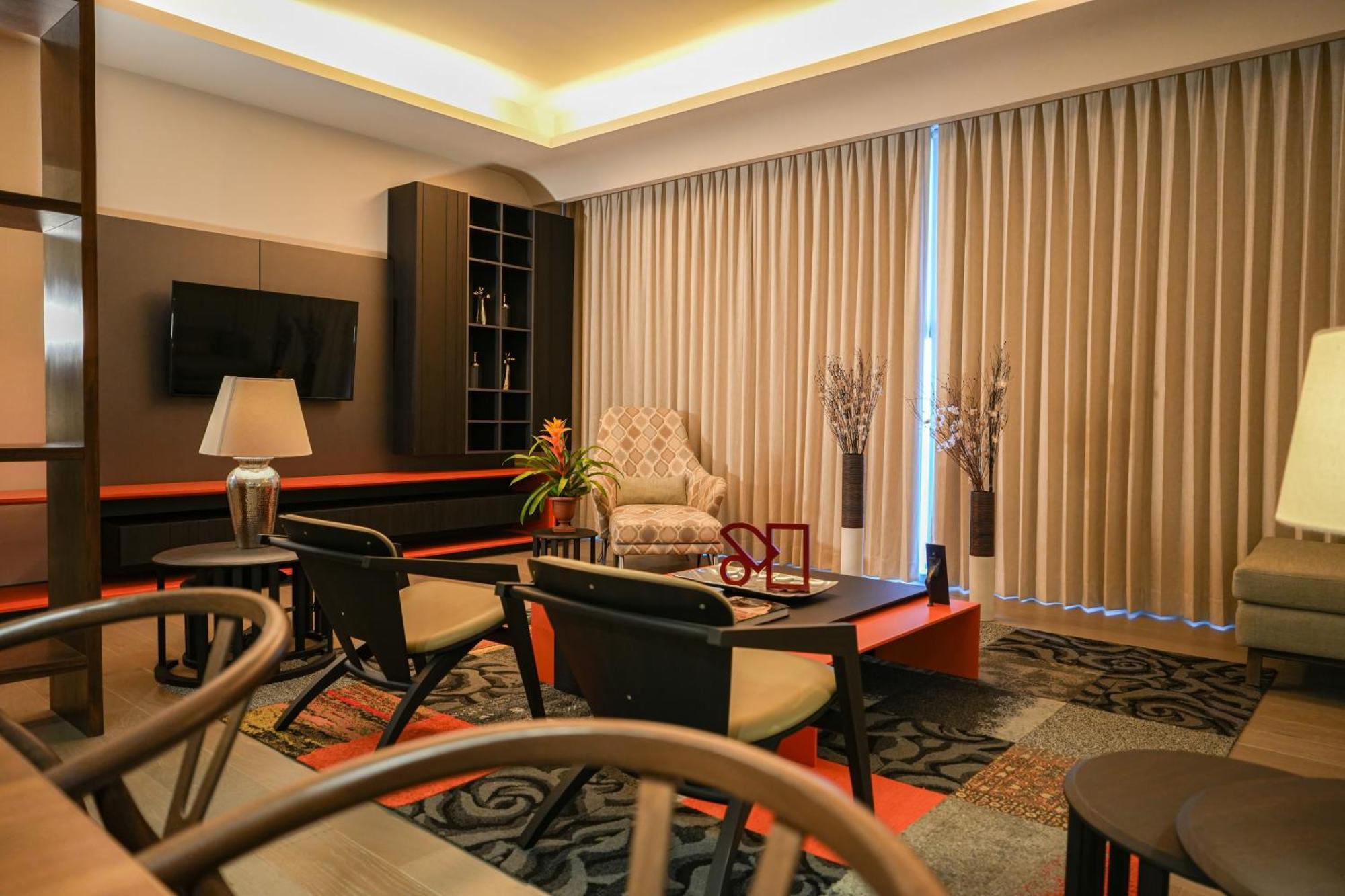 Metria Hotel León de los Aldamas Extérieur photo A living room in a condominium